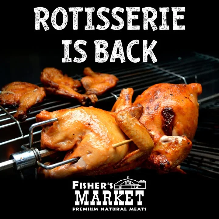 Rotisserie chicken and wings on a grill