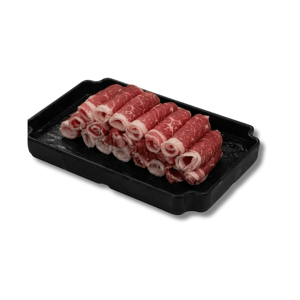 Thinly sliced beef rolls arranged on a black tray.