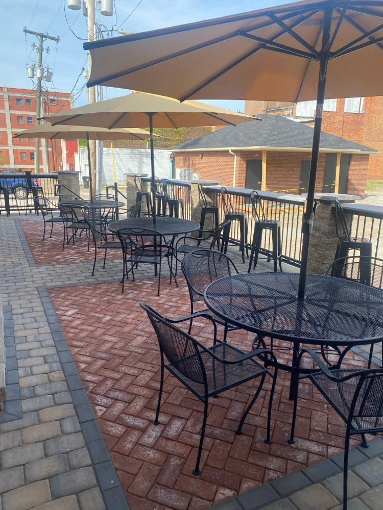 Outdoor dining area with umbrellas and tables