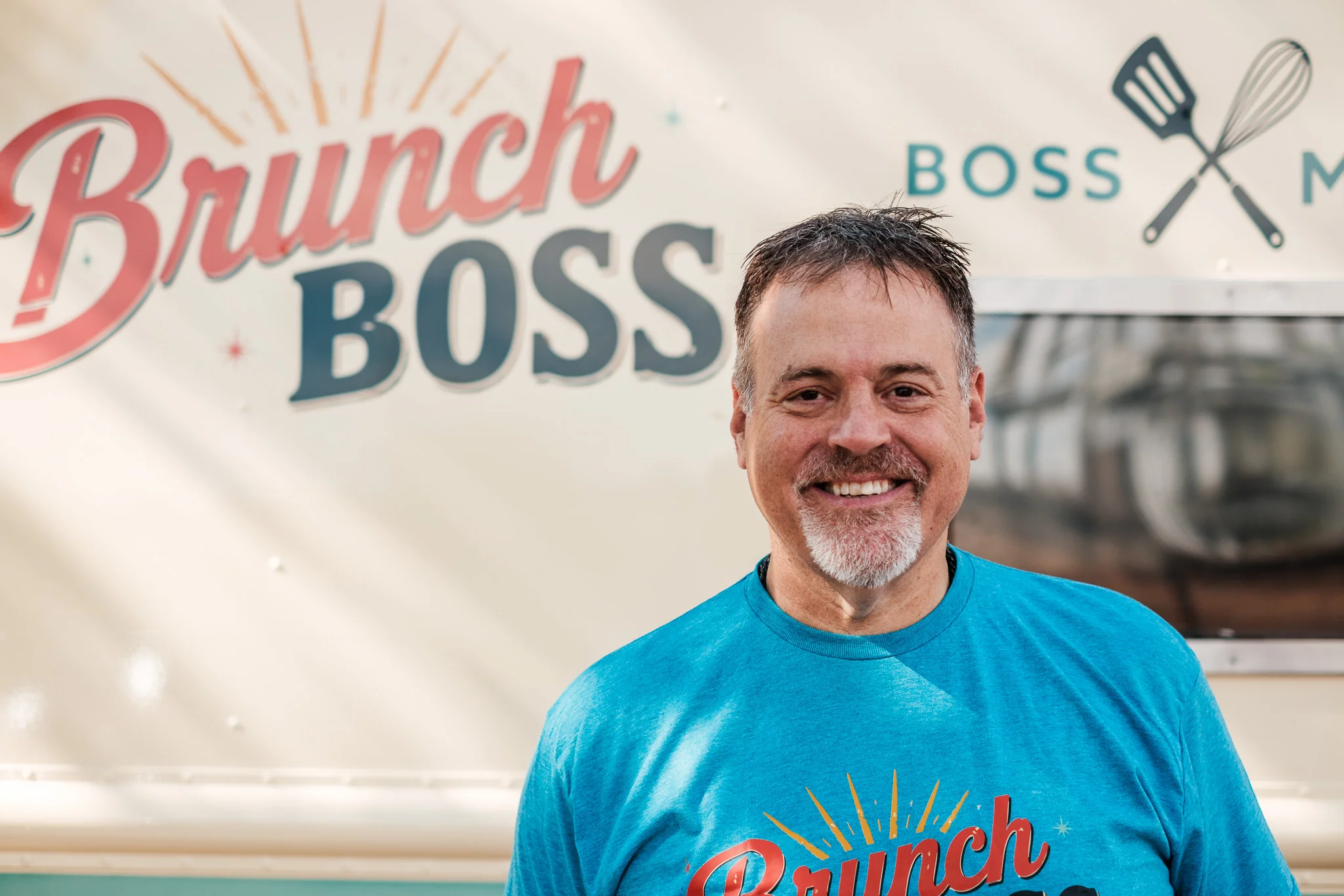 Brunch food truck with vibrant branding and cheerful atmosphere