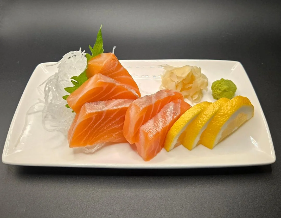 Japanese sashimi platter with fresh salmon and garnishes