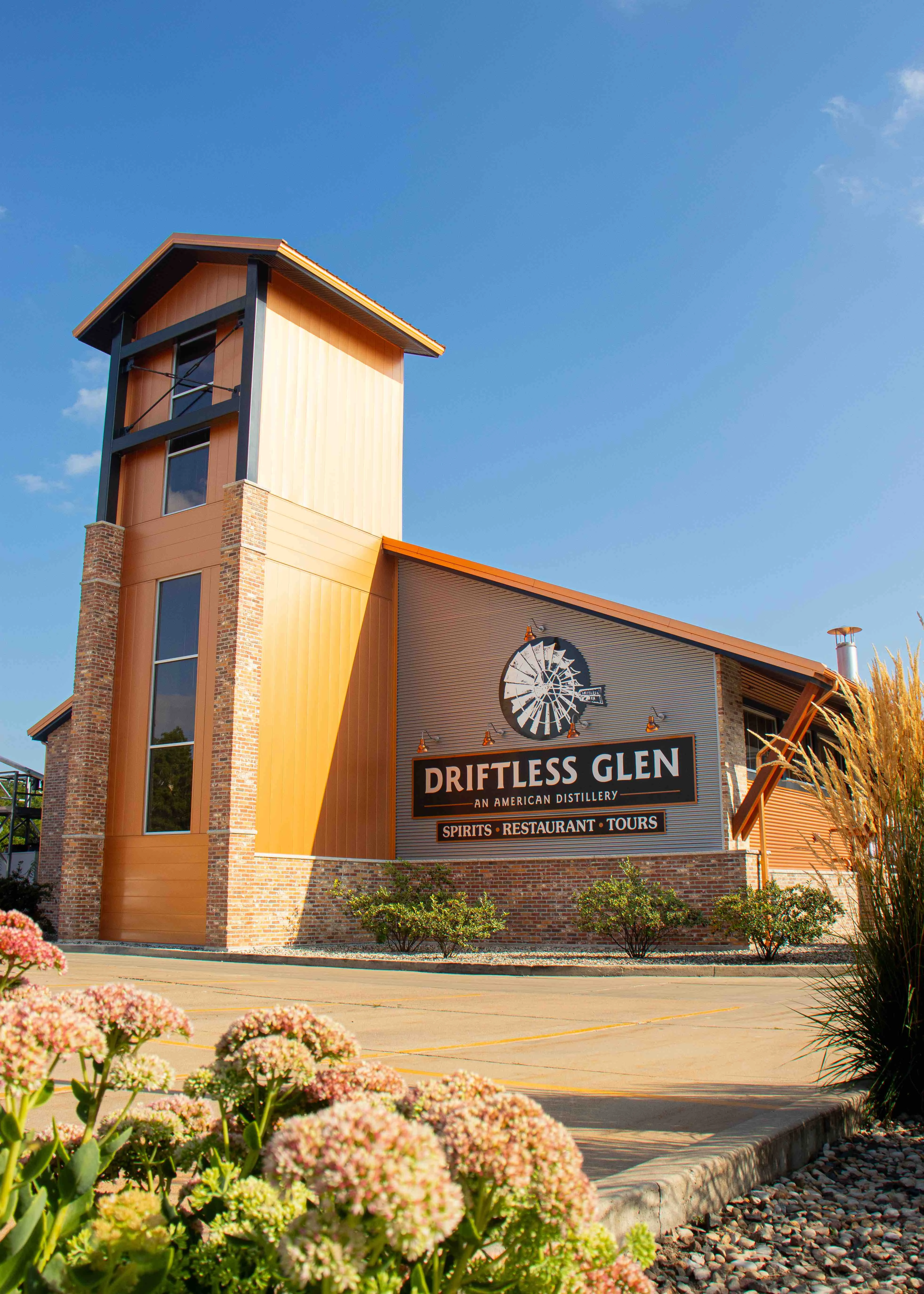 The exterior of the DG building on a sunny day