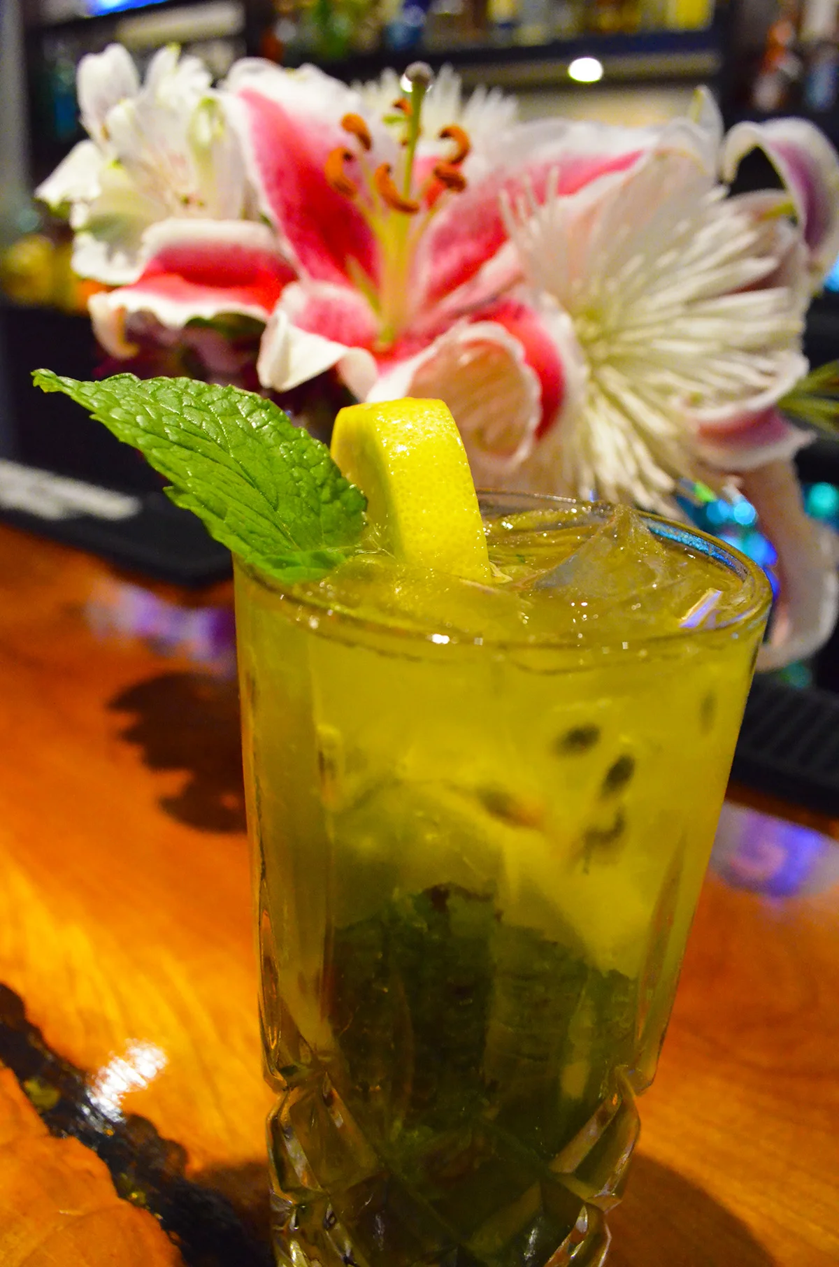Refreshing mojito cocktail with mint and lemon garnish