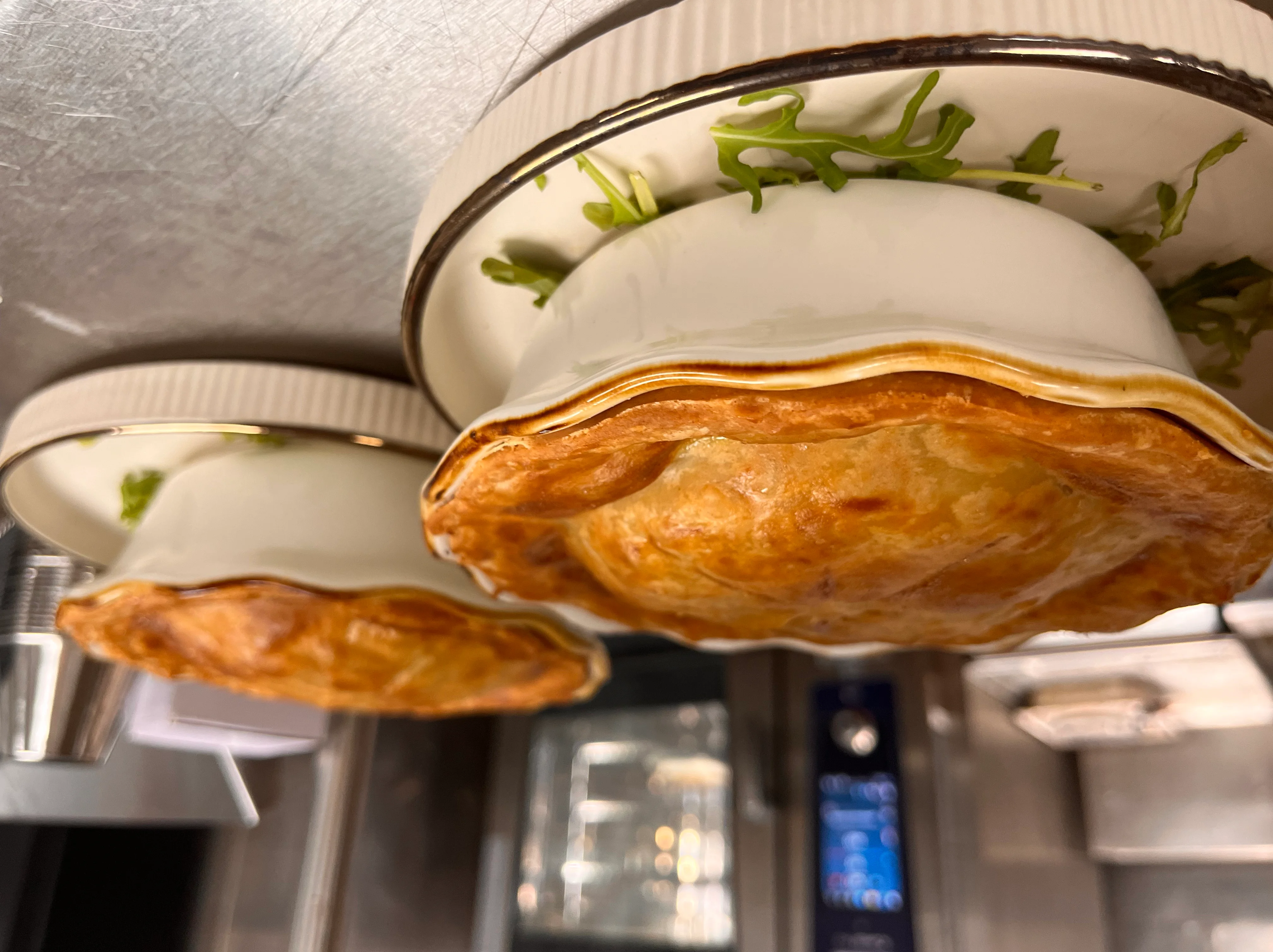 A restaurant chef preparing a dish