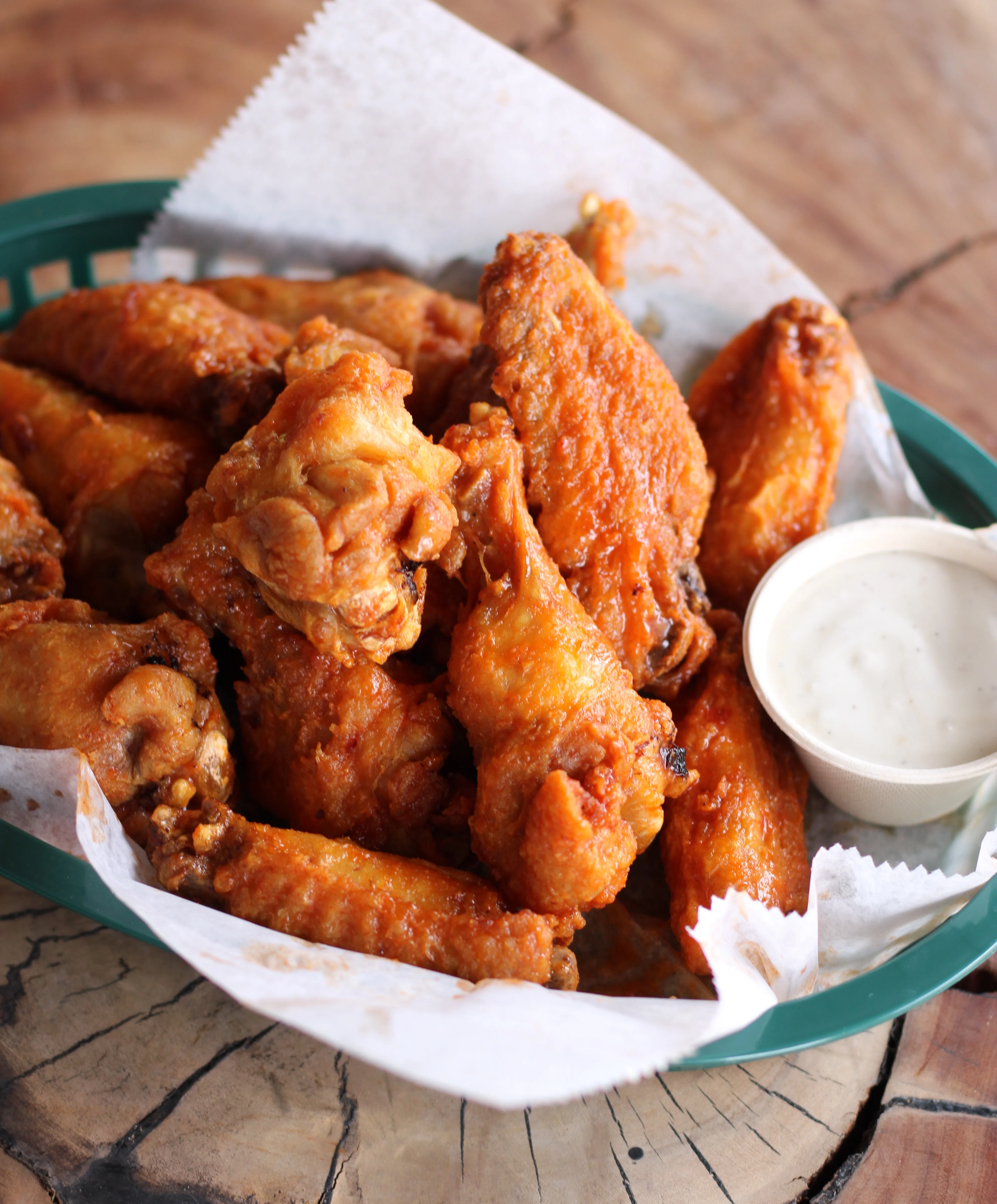 Crispy buffalo chicken wings served with ranch dressing
