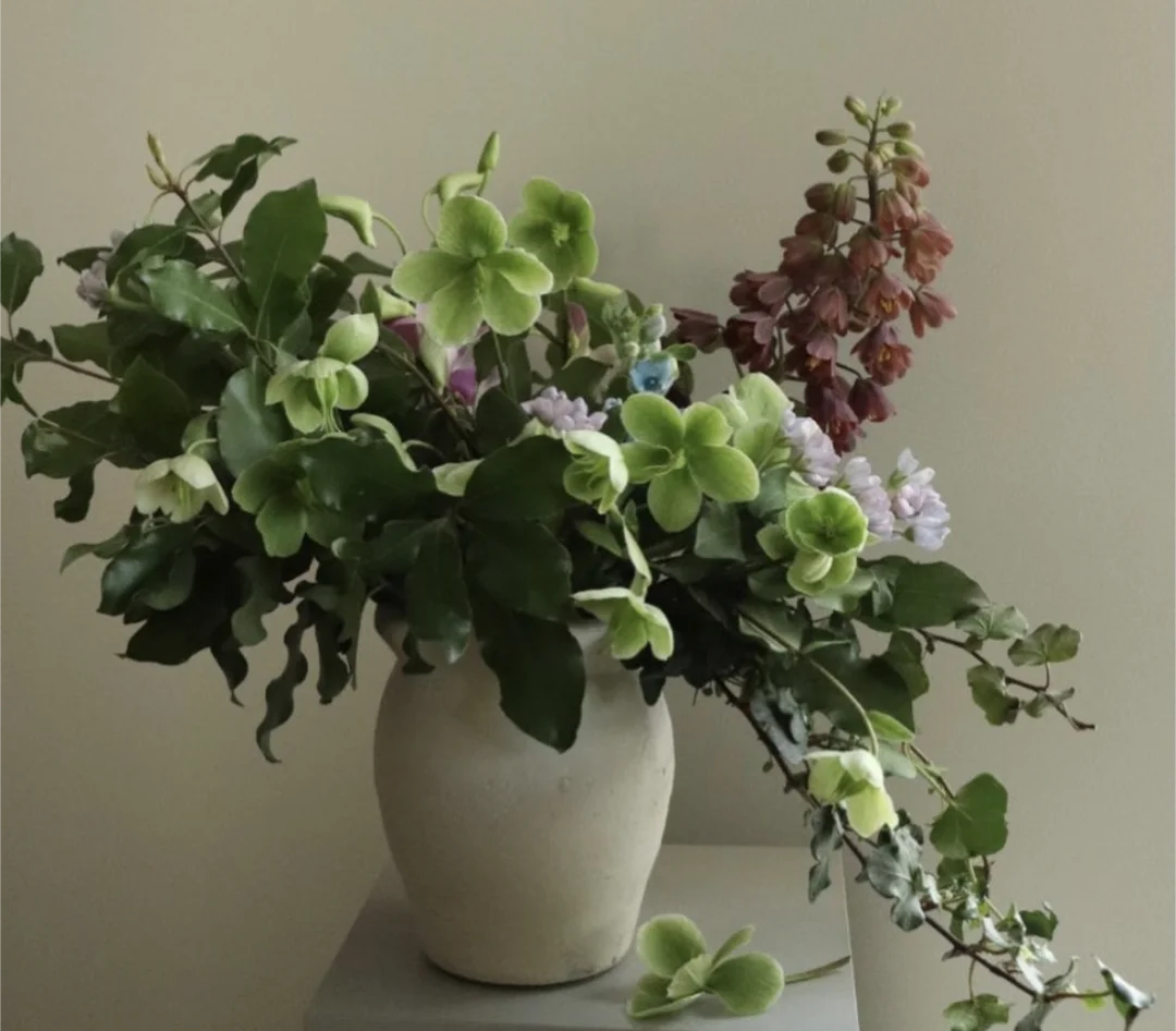 Elegant floral arrangement in a ceramic vase