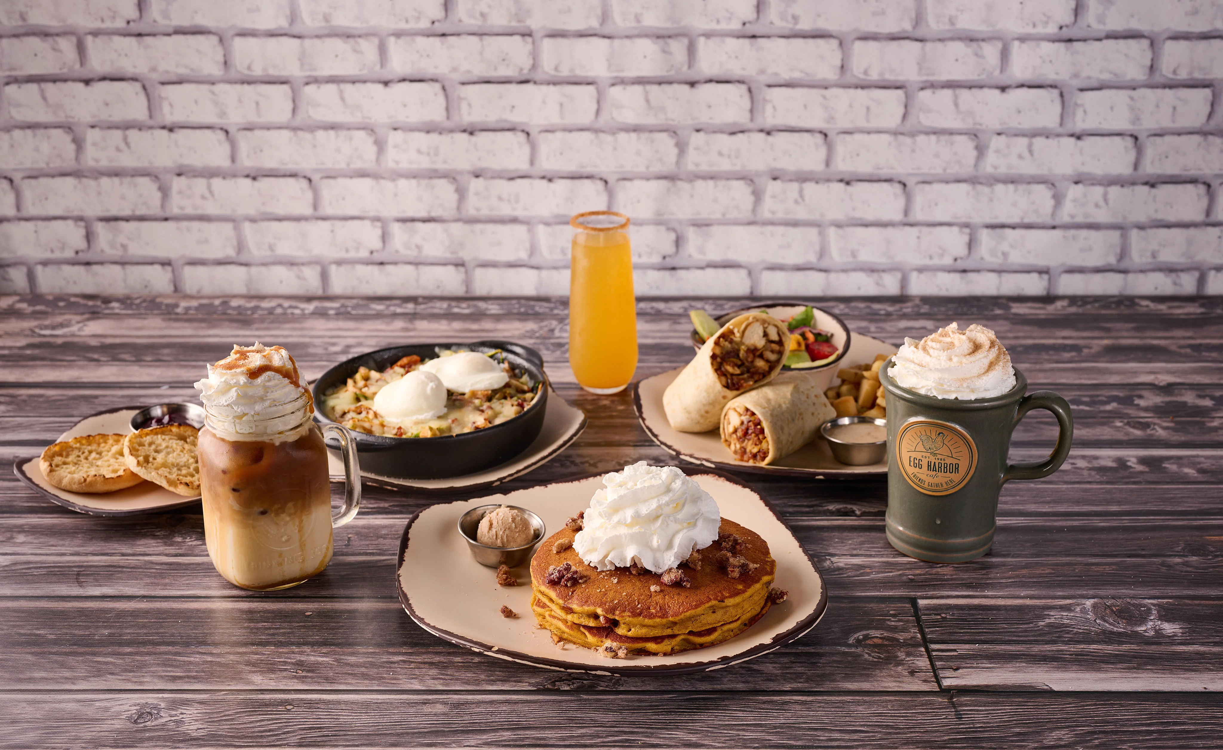 Delicious brunch spread featuring pancakes and breakfast skillet