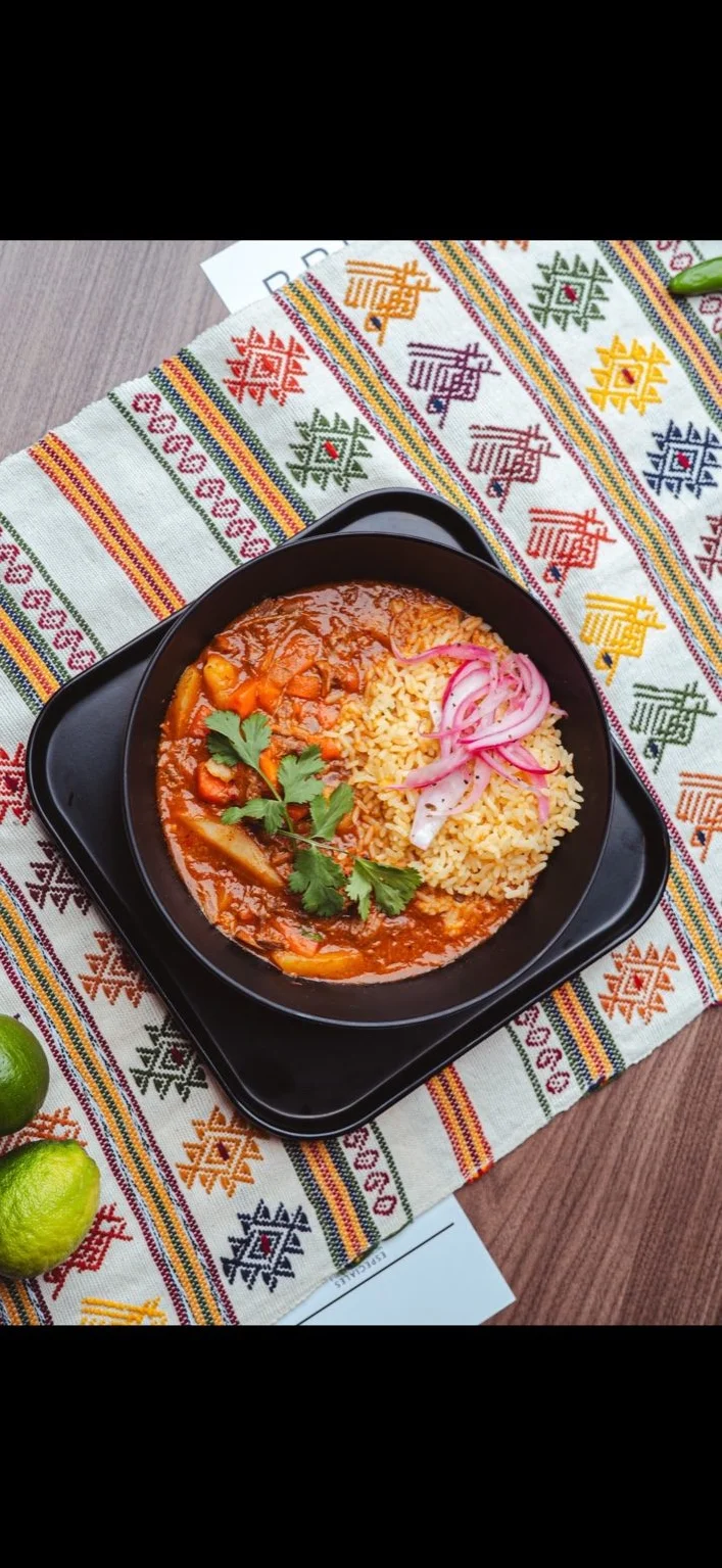 Delicious Indian curry with basmati rice and pickled onions