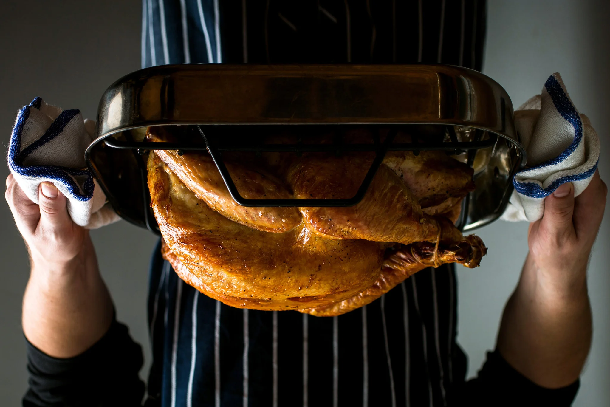 Golden roasted turkey on a serving tray