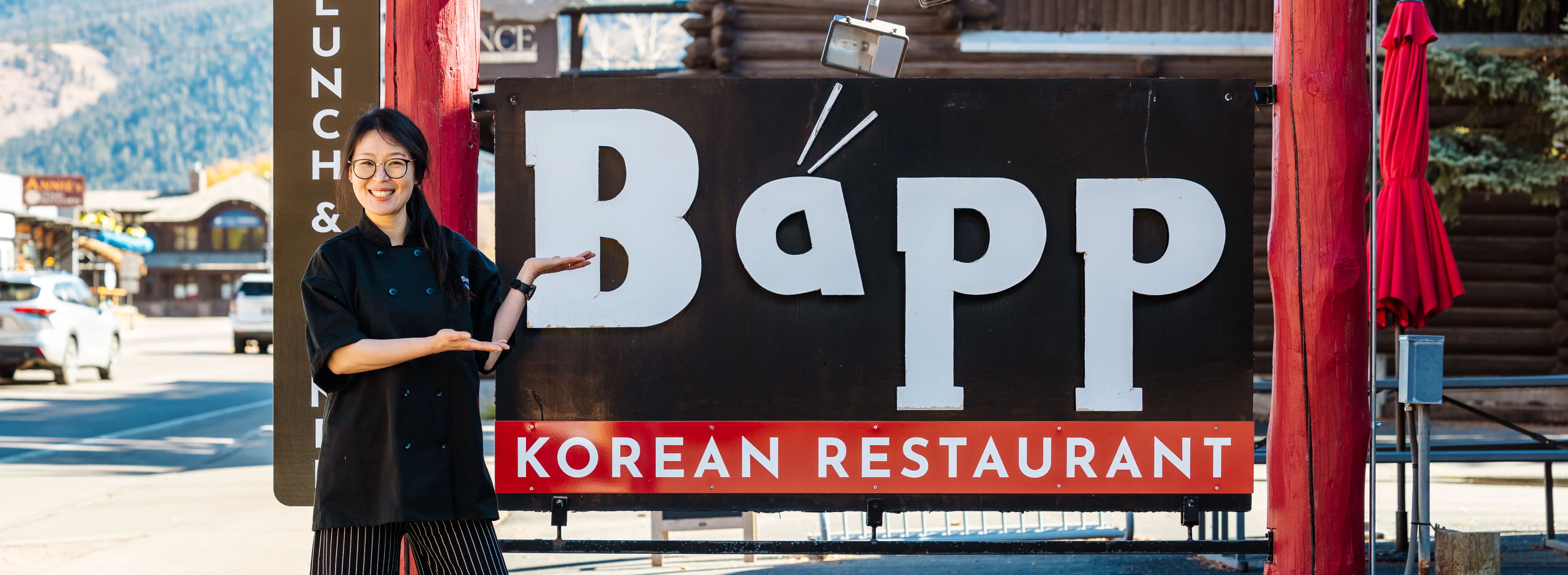 Owner welcoming guests at Bapp Korean Restaurant