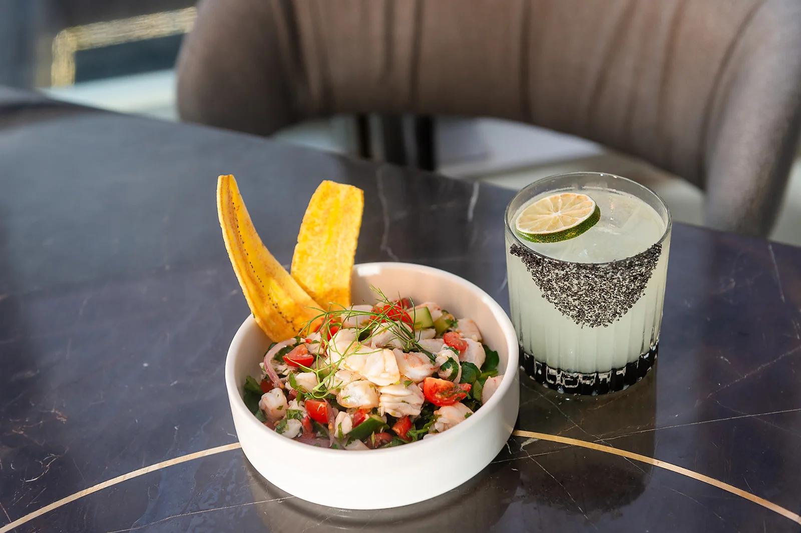 Ceviche with plantain chips and cocktail