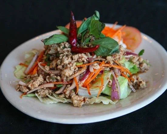Thai larb salad with minced meat and fresh herbs