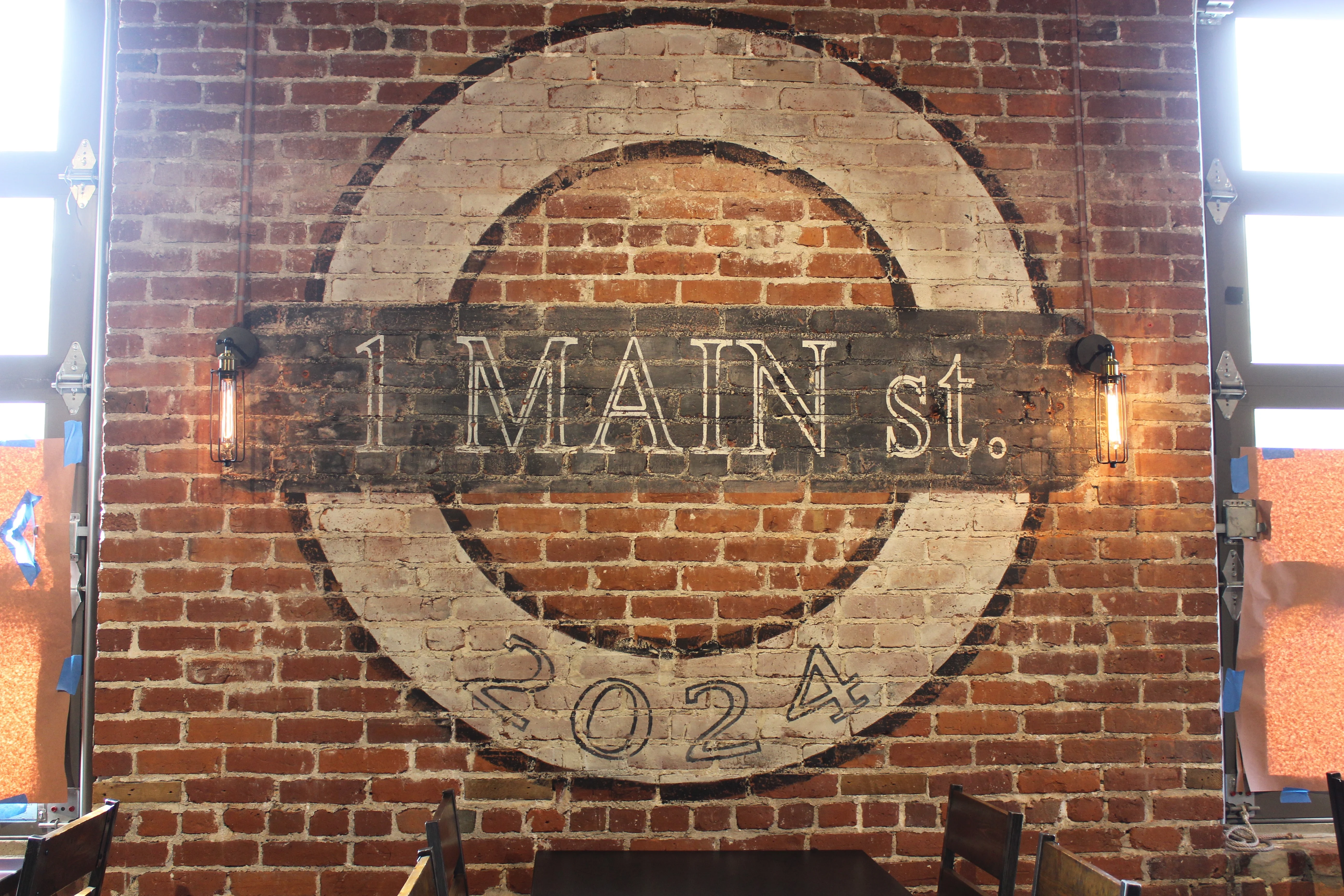 Cozy restaurant interior with exposed brick and vintage lighting
