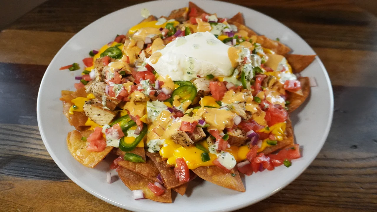 Loaded chicken nachos with toppings