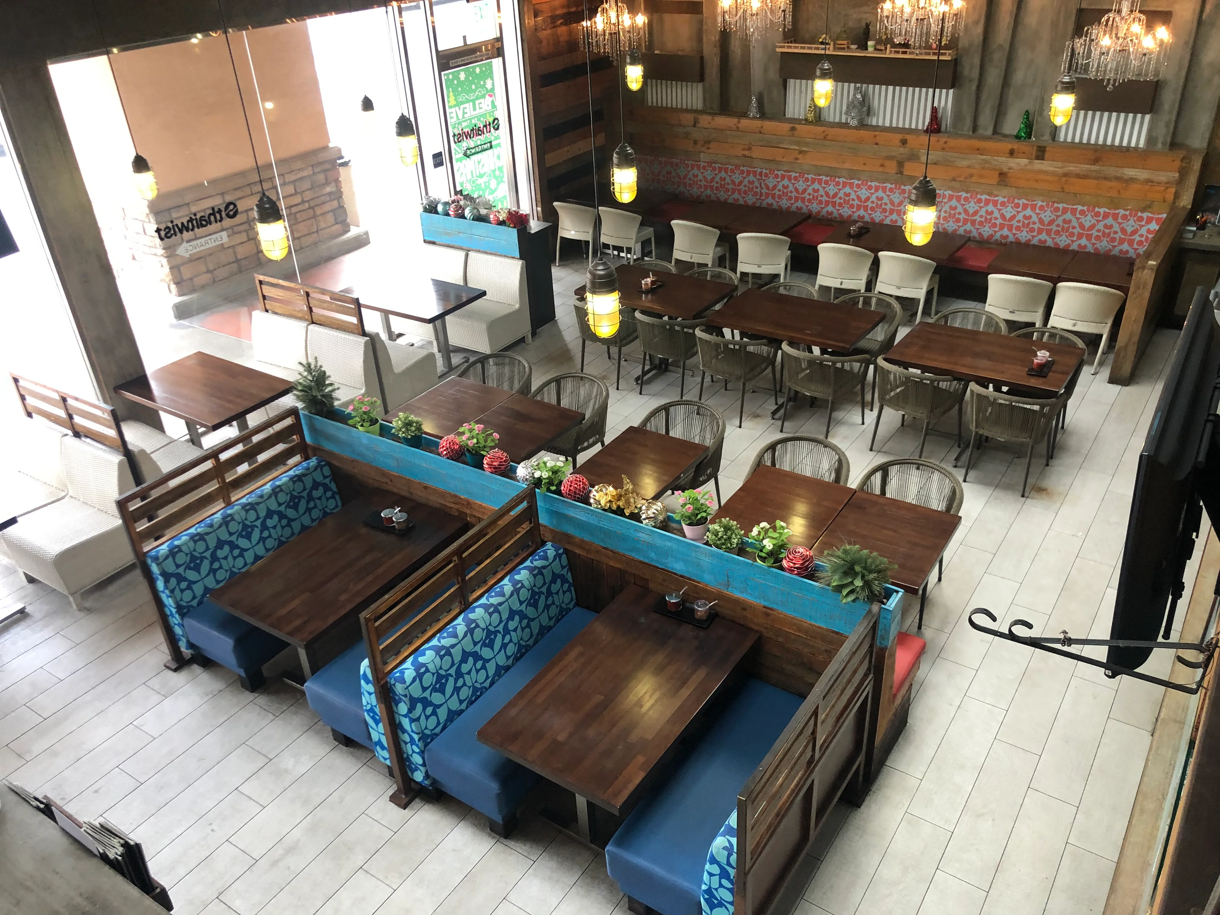 Cozy restaurant interior with colorful decor and wooden furniture