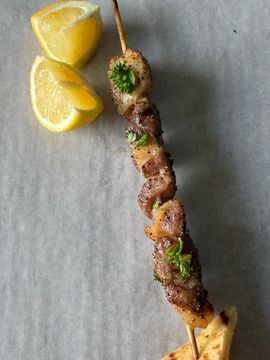 Pork souvlaki skewer