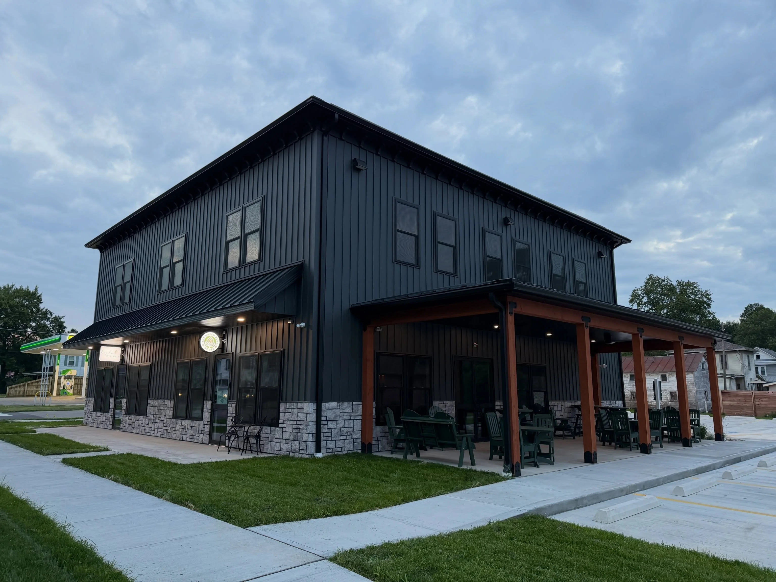 Modern restaurant exterior with outdoor seating and stylish design