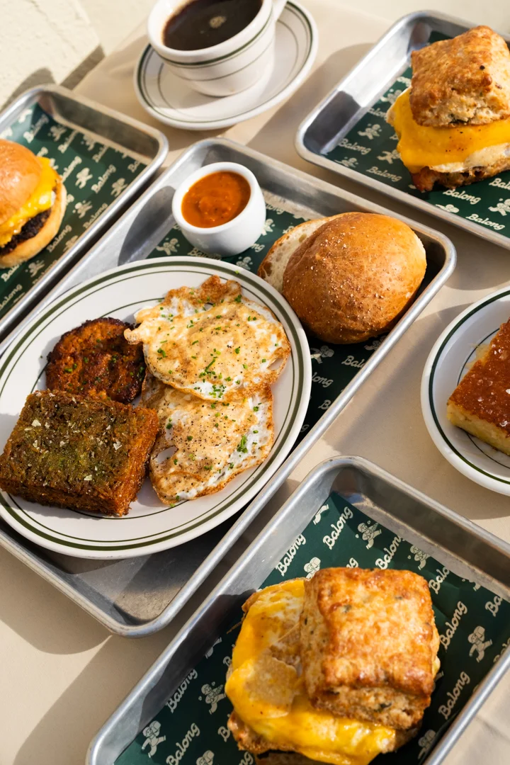 Southern breakfast platter with biscuits, eggs, and coffee