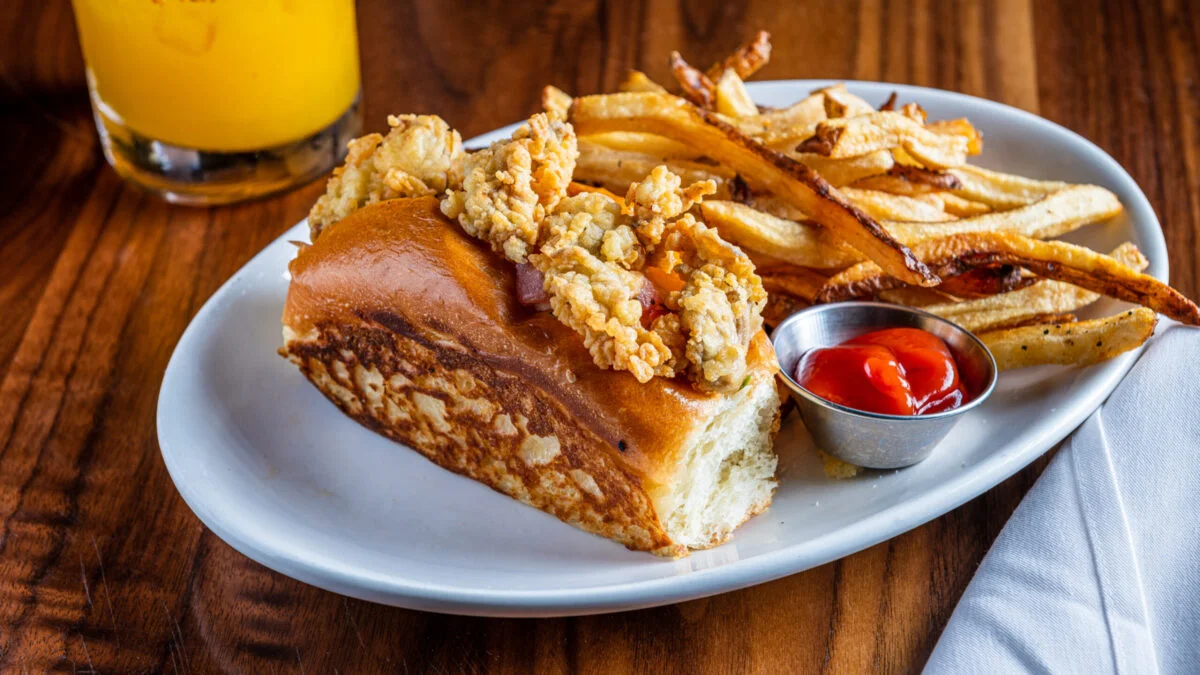 Southern-style po' boy sandwich with crispy fried seafood and fries