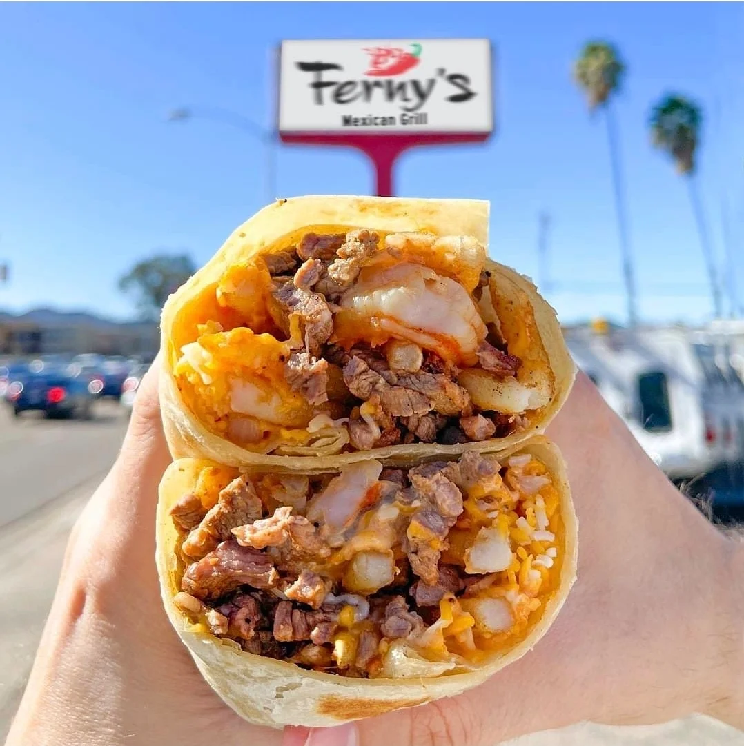 Delicious Mexican burrito filled with beef and cheese