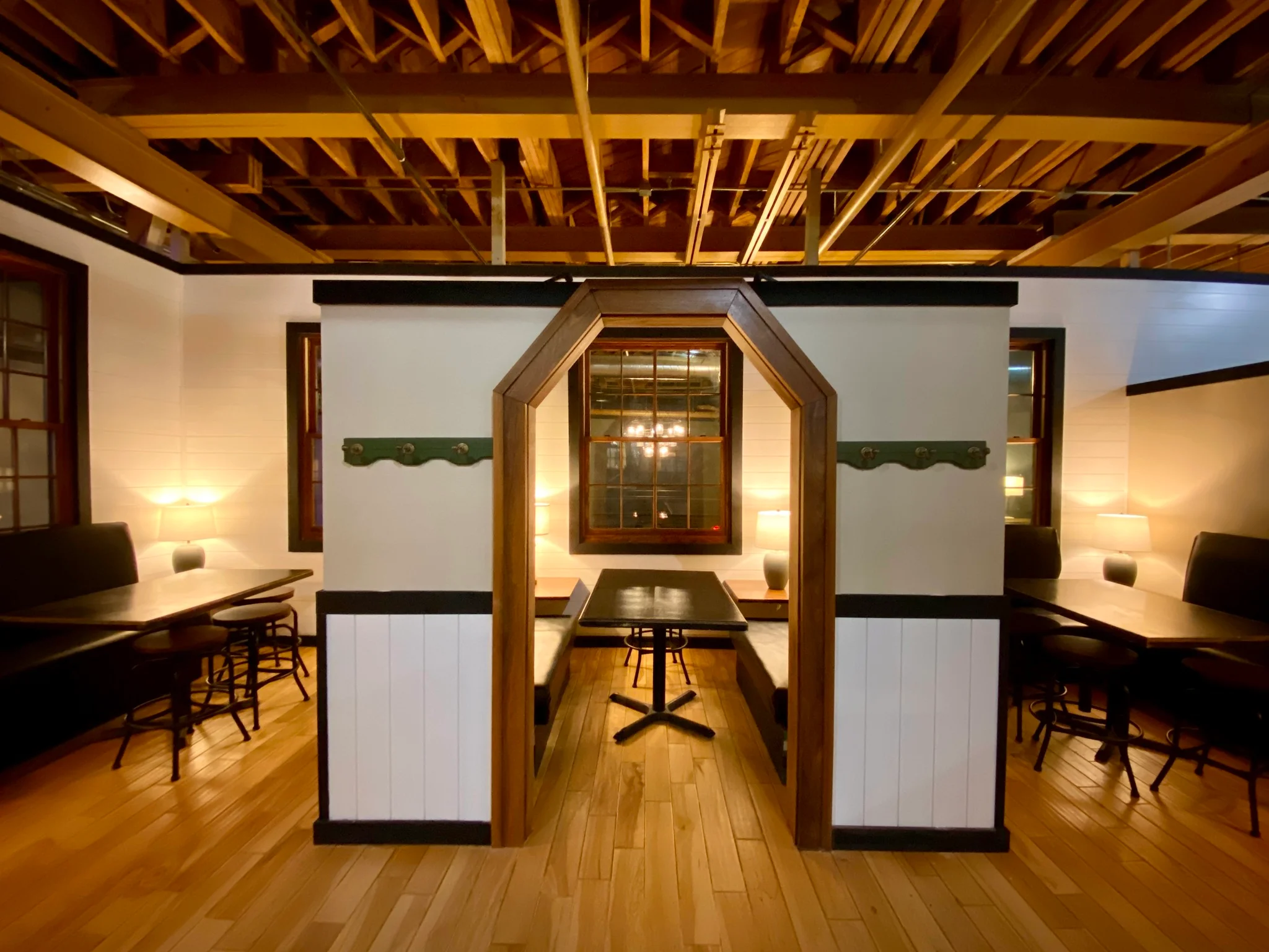 Cozy restaurant interior with wooden accents and warm lighting