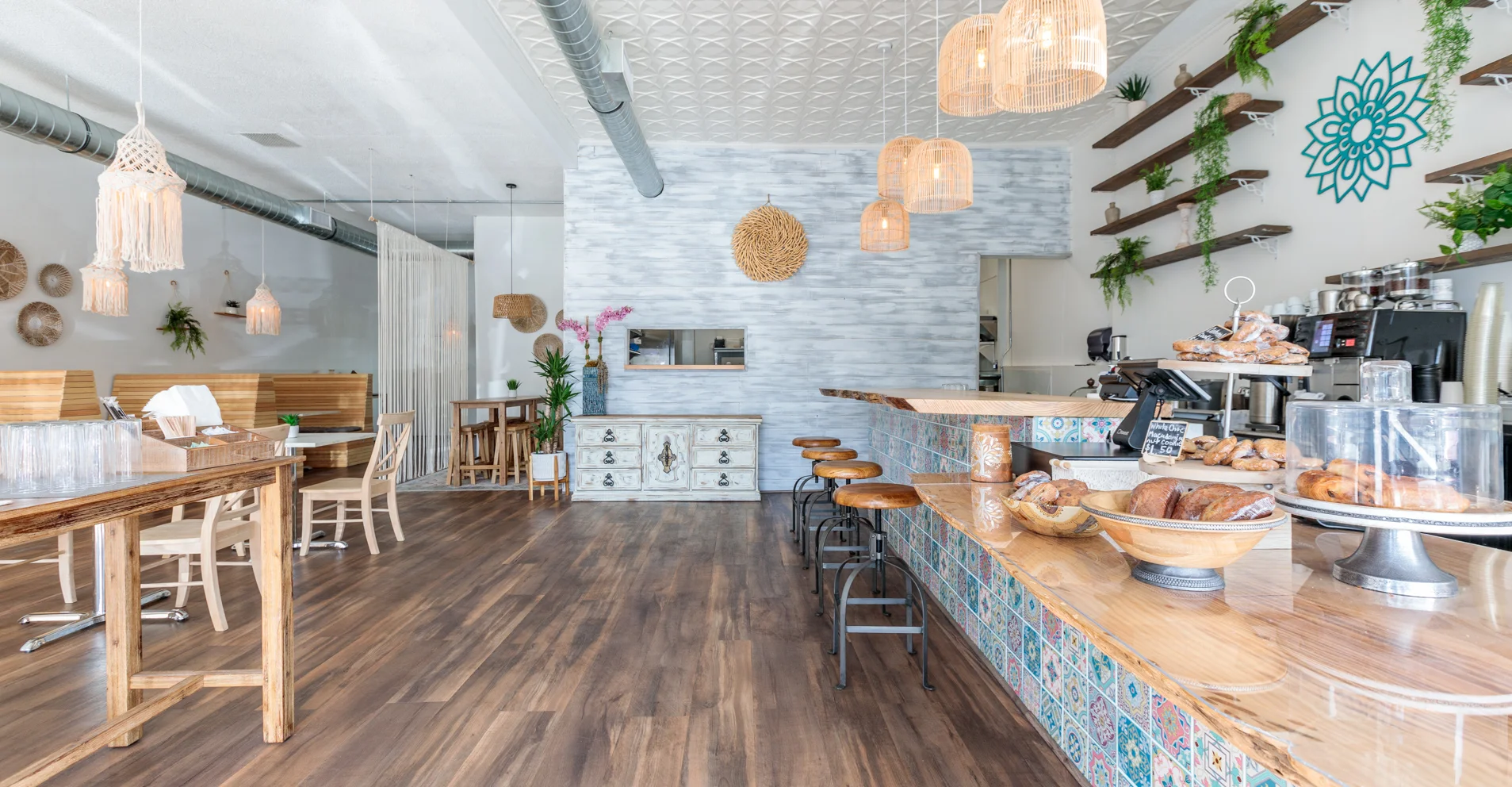 Modern restaurant interior with natural decor and cozy seating