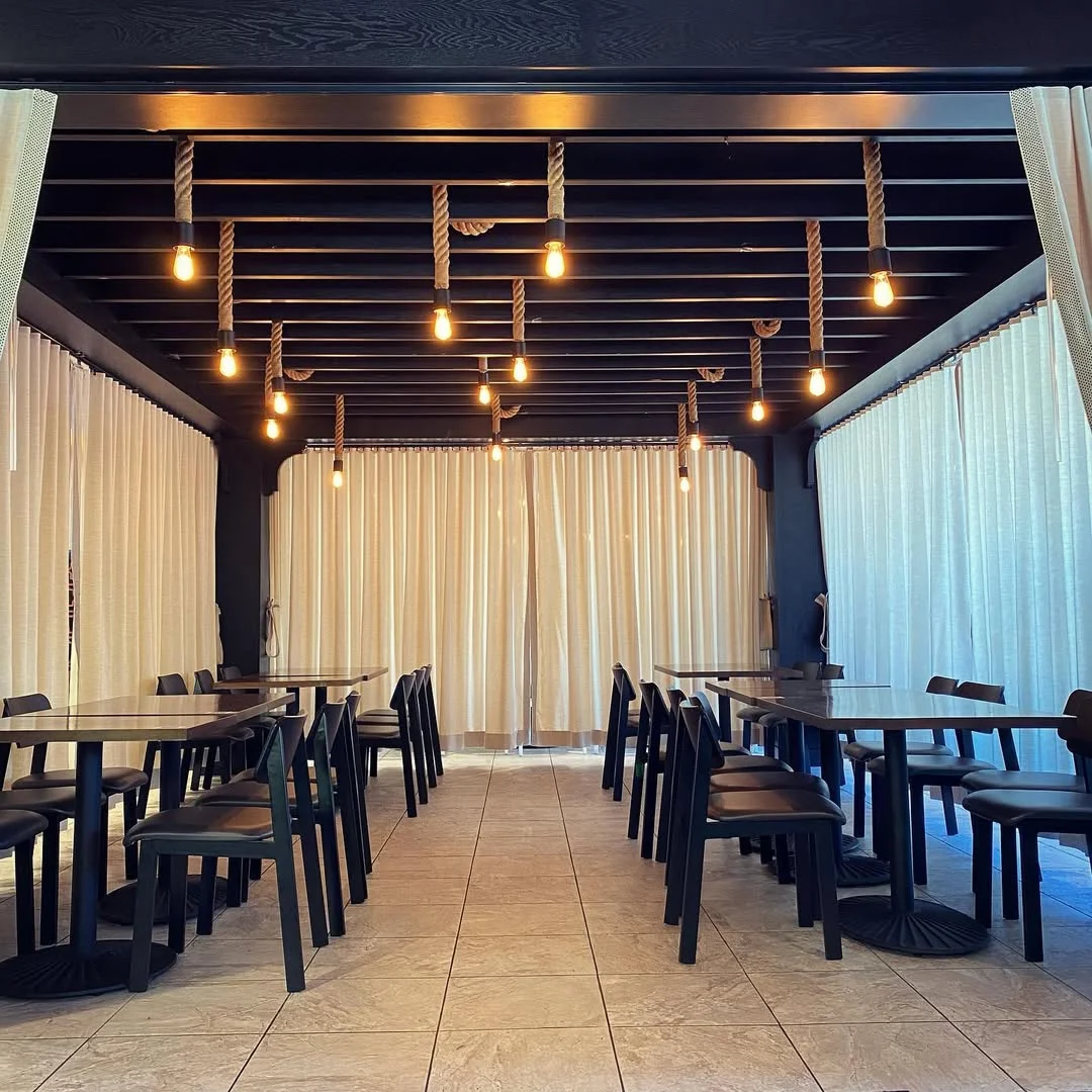 Comfortable seating area at Malek Al Kabob for casual dining
