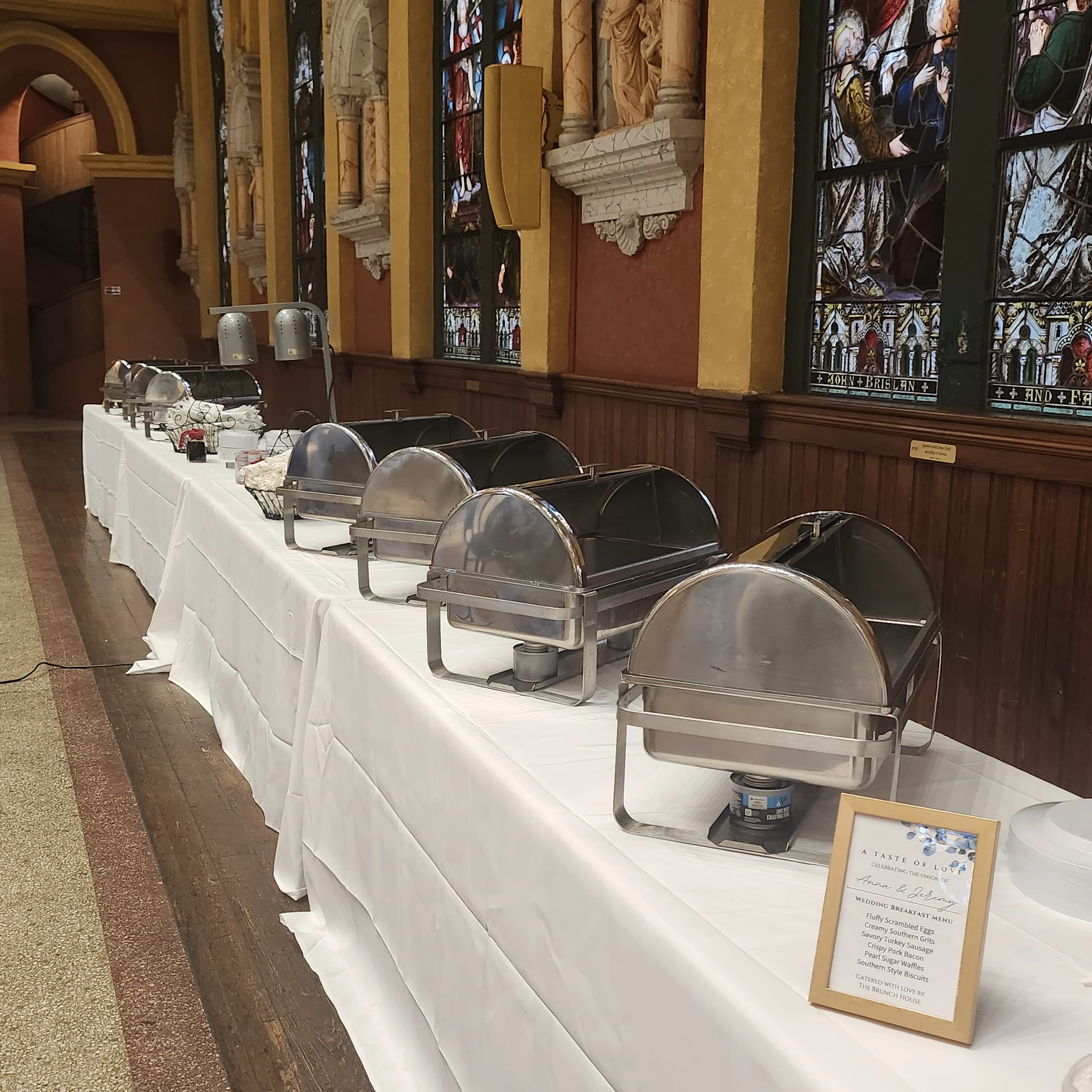 Brunch House buffet catering setup with chafing dishes at a wedding venue