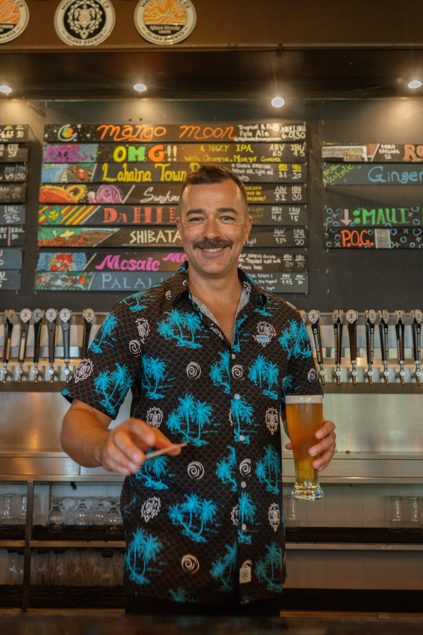 Bartender serving craft beer at a vibrant bar