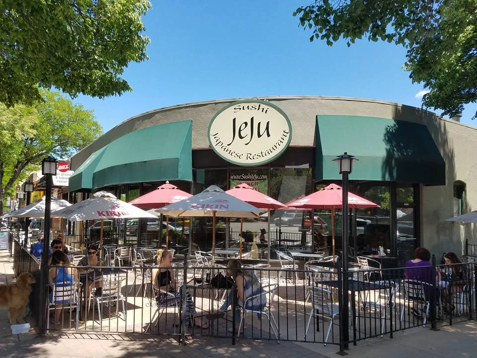 Exterior view of Sushi Jeju Japanese restaurant with outdoor seating