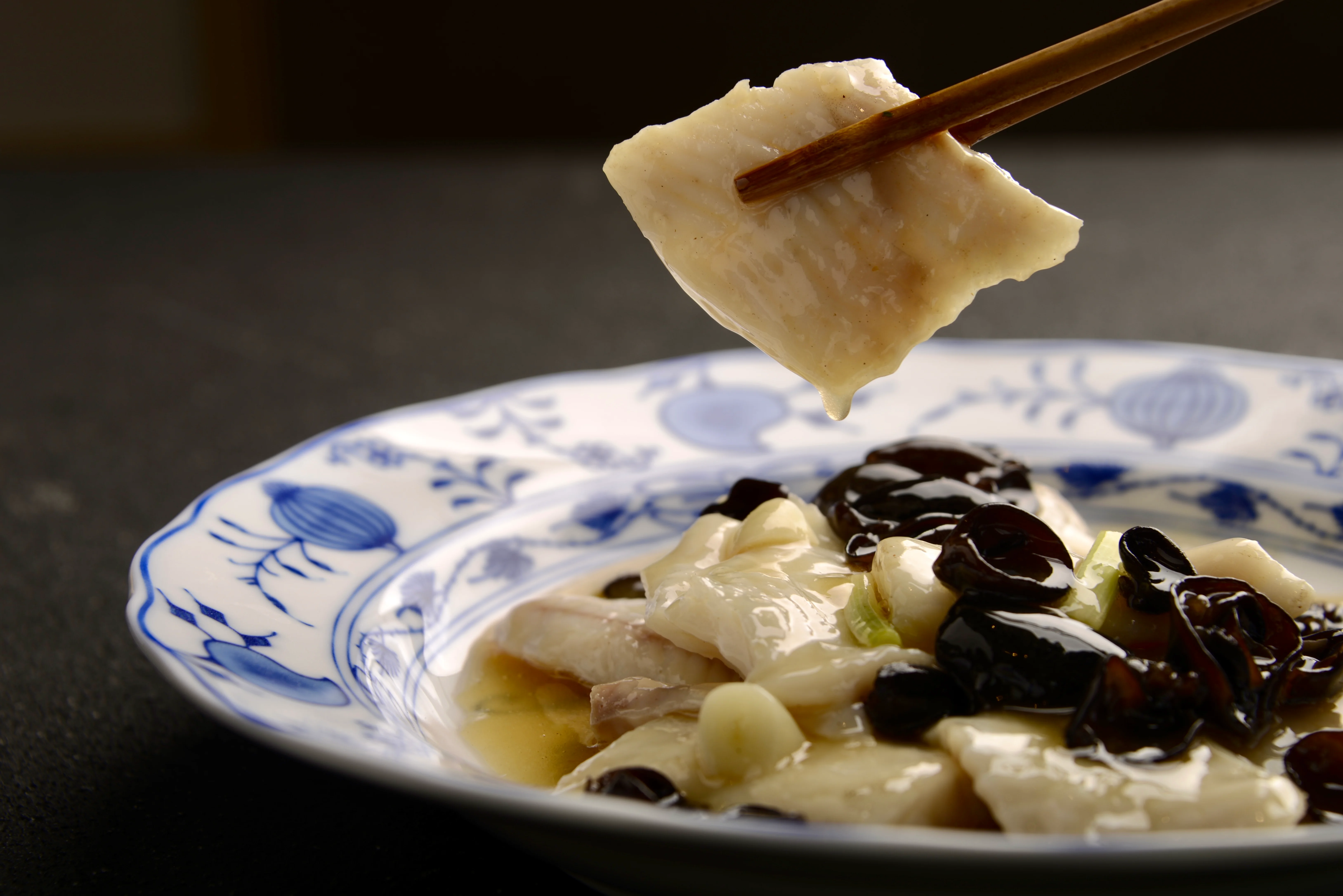 Chinese steamed fish with black mushrooms