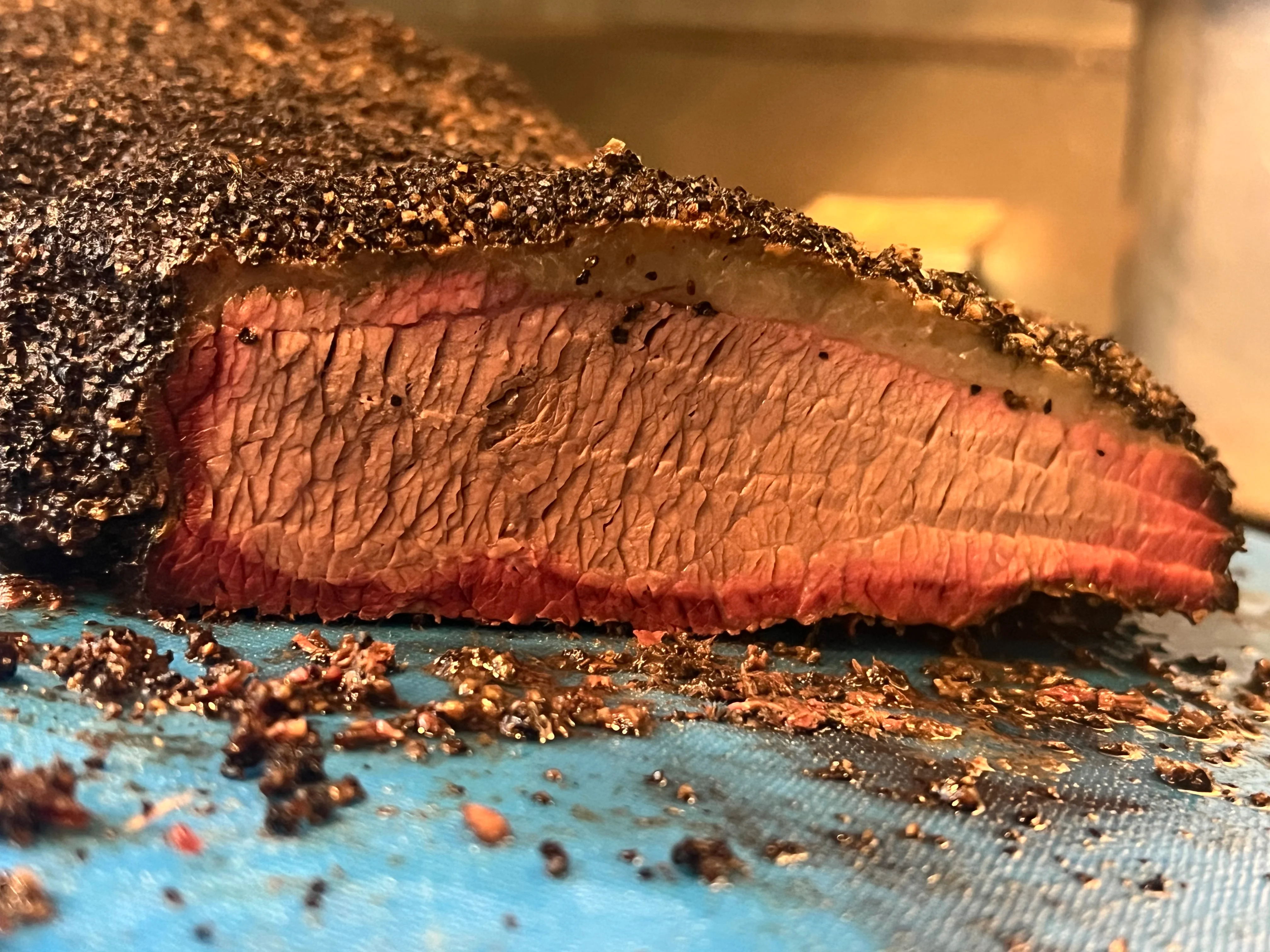 Smoked brisket with a flavorful crust, showcasing Texas barbecue style