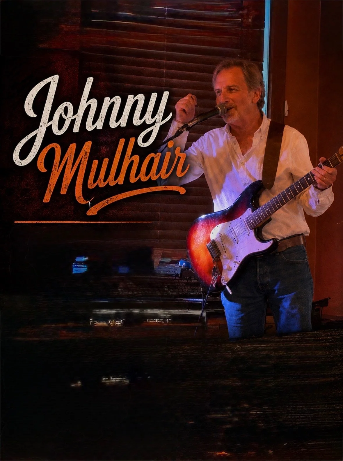 Musician performing live with electric guitar in a cozy venue