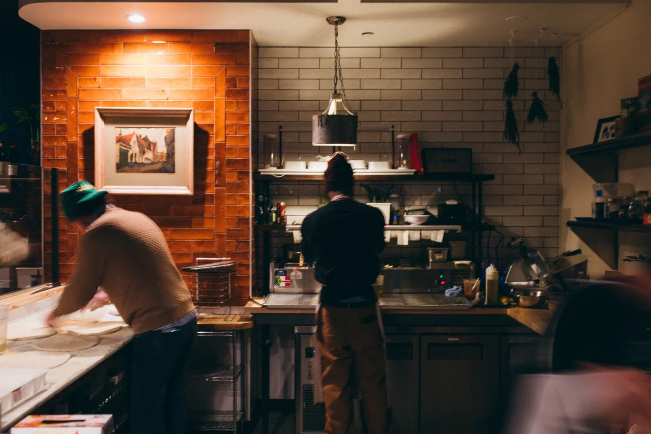 A restaurant chef preparing food at Nettie's
