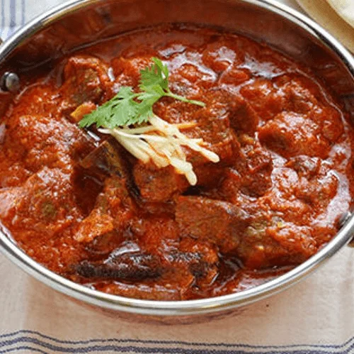 Indian Curry with tomato sauce and spices with cottage cheese 