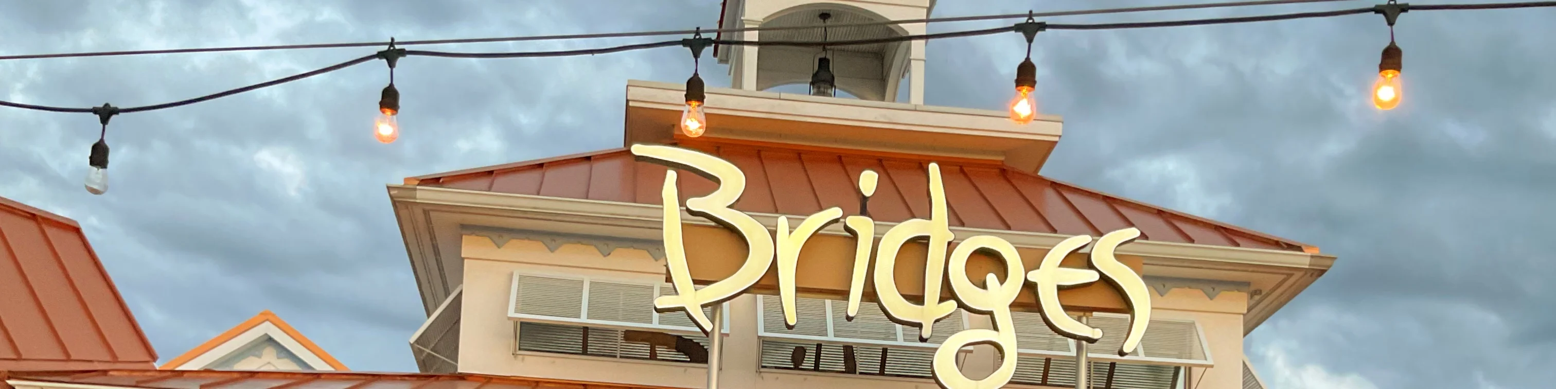 Restaurant sign for Bridges with decorative lighting