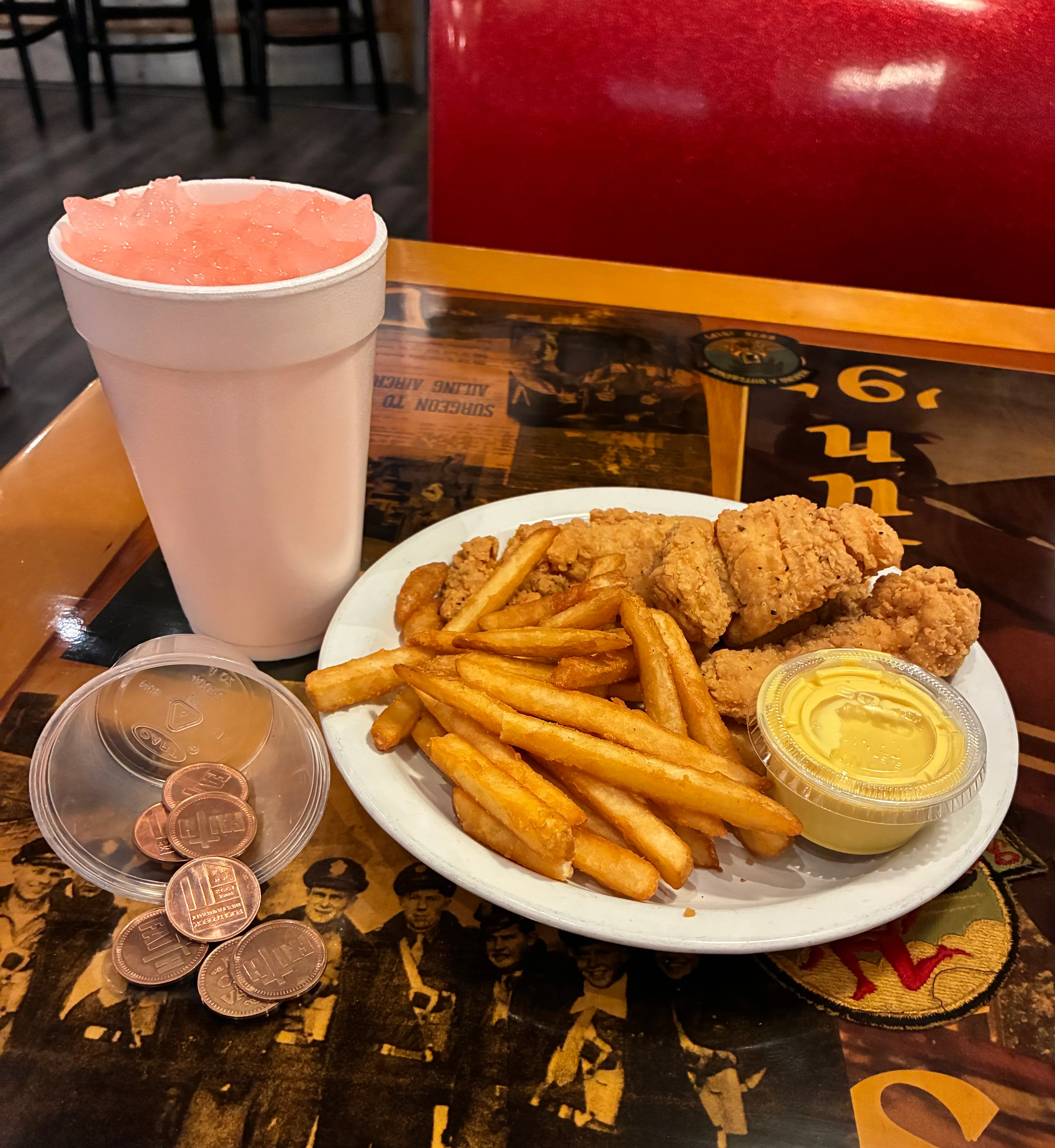 Fried seafood platter with fries and dipping sauces