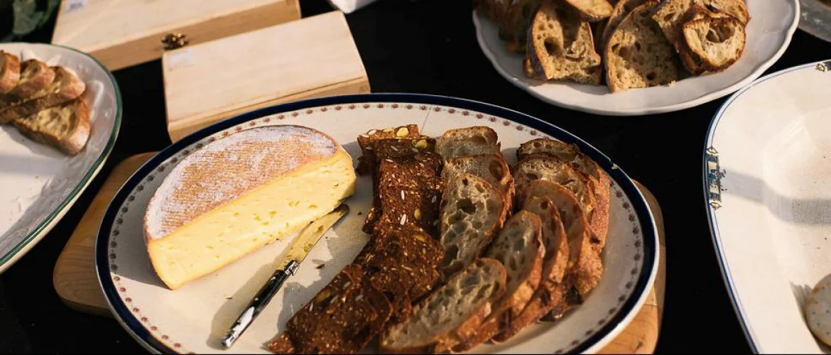 Artisan cheese platter with crusty bread and crackers