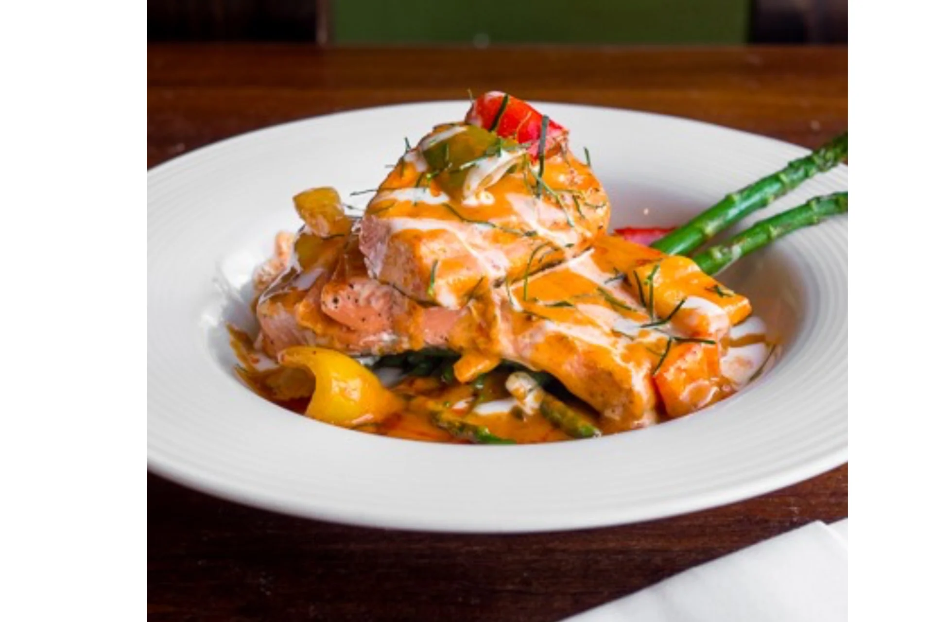 Creamy salmon tikka masala with asparagus