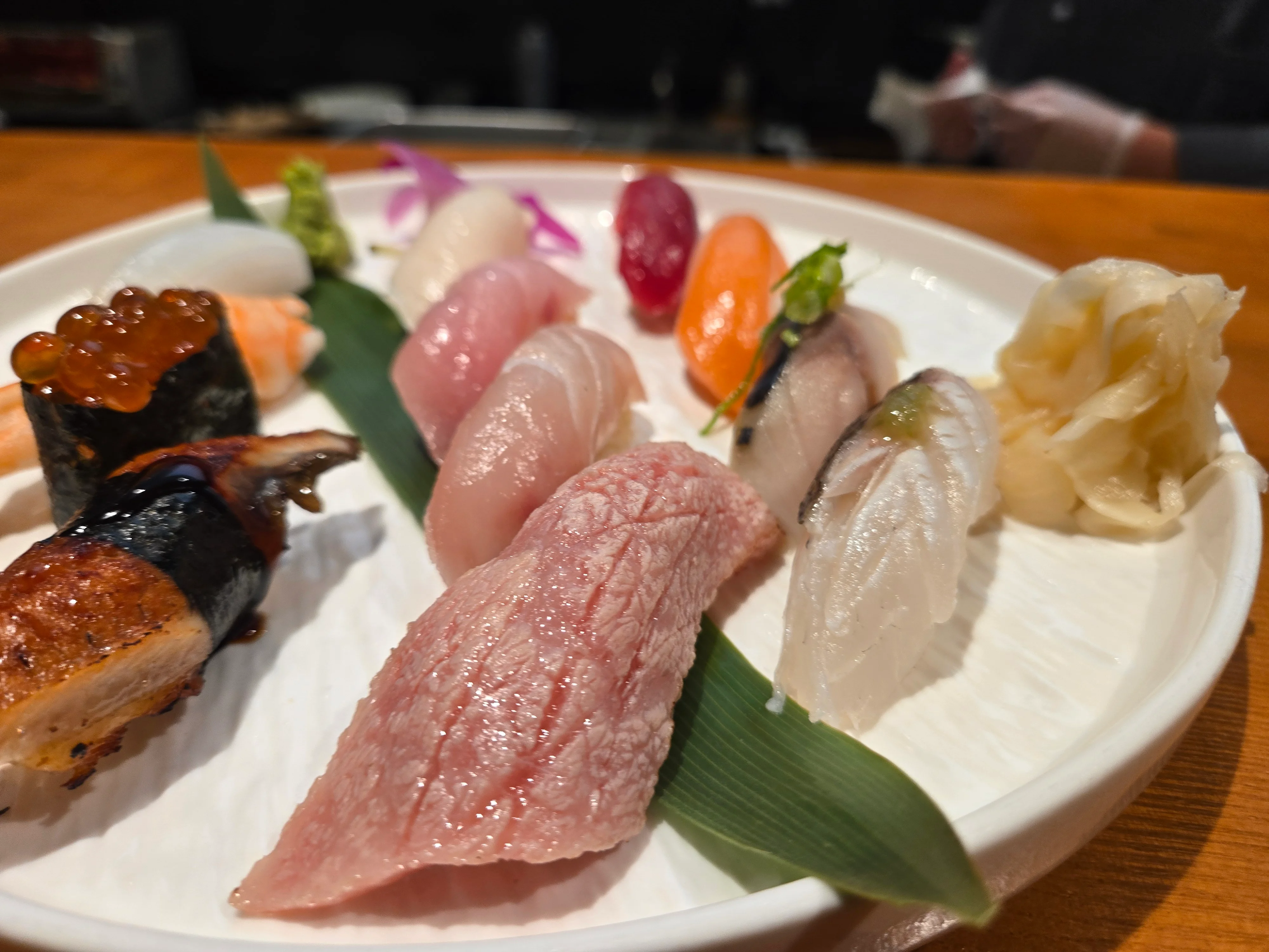 Assorted Japanese sushi platter with fresh fish and garnishes