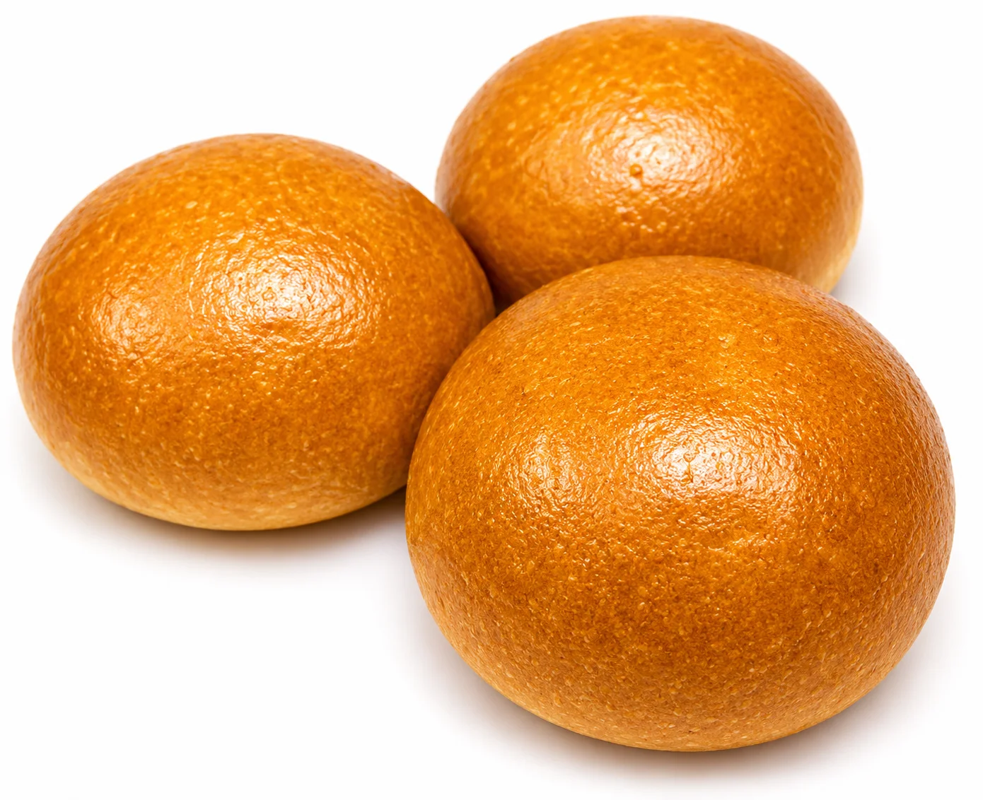 Three round, golden-brown bread rolls on a white background.
