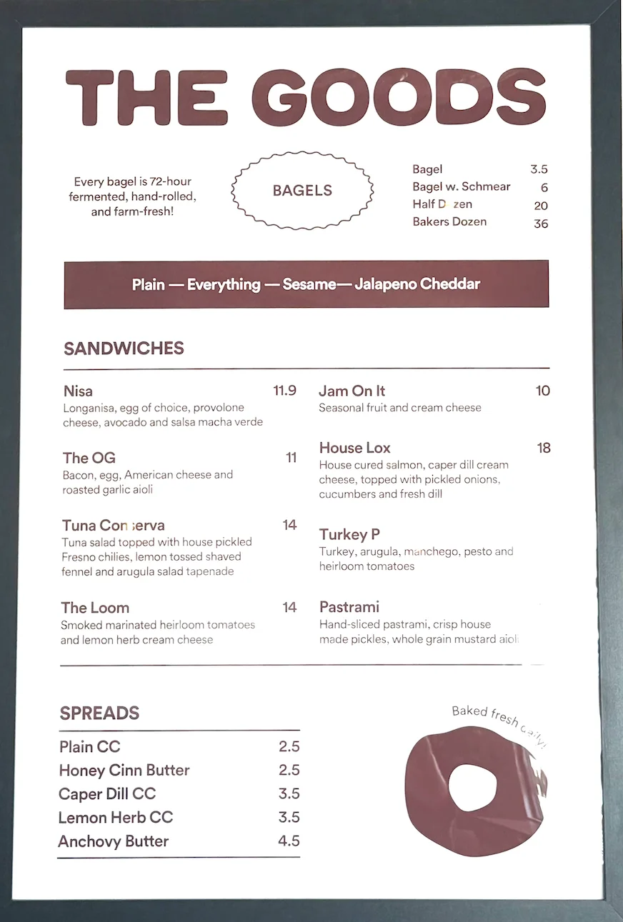 Menu featuring bagels and sandwiches with prices and descriptions.