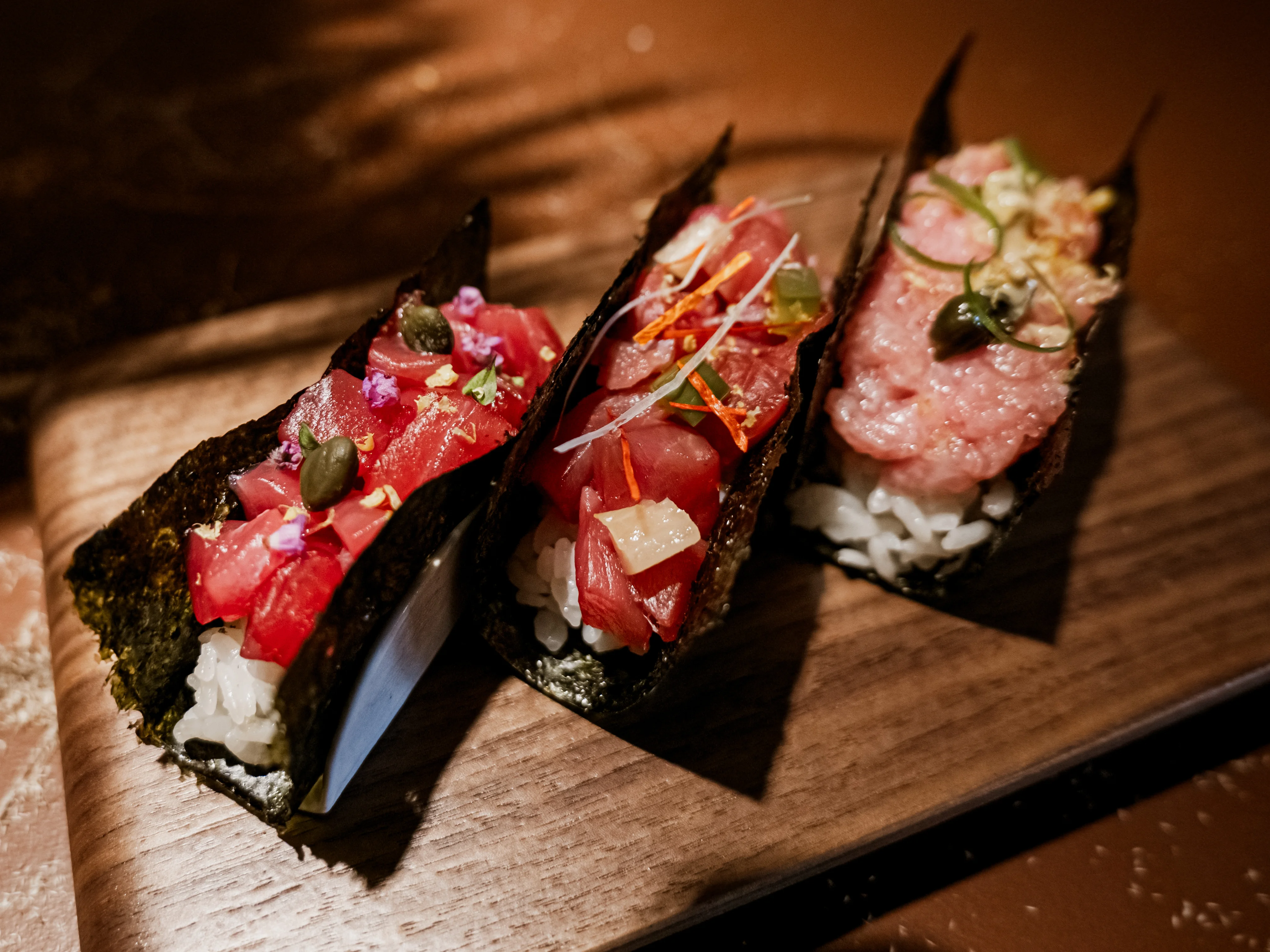 Japanese sushi hand rolls with fresh fish
