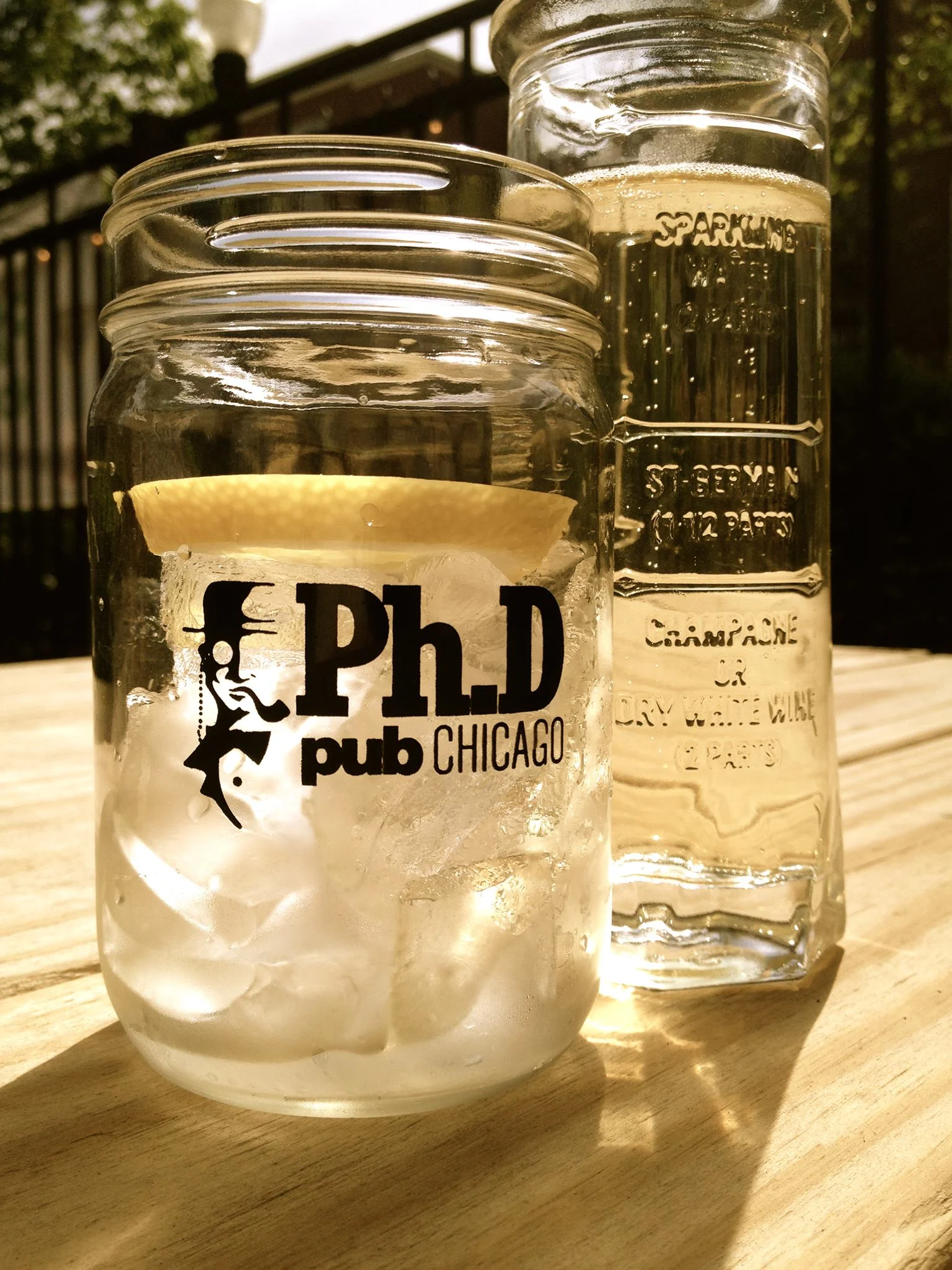 Refreshing drink in a mason jar with lemon slice
