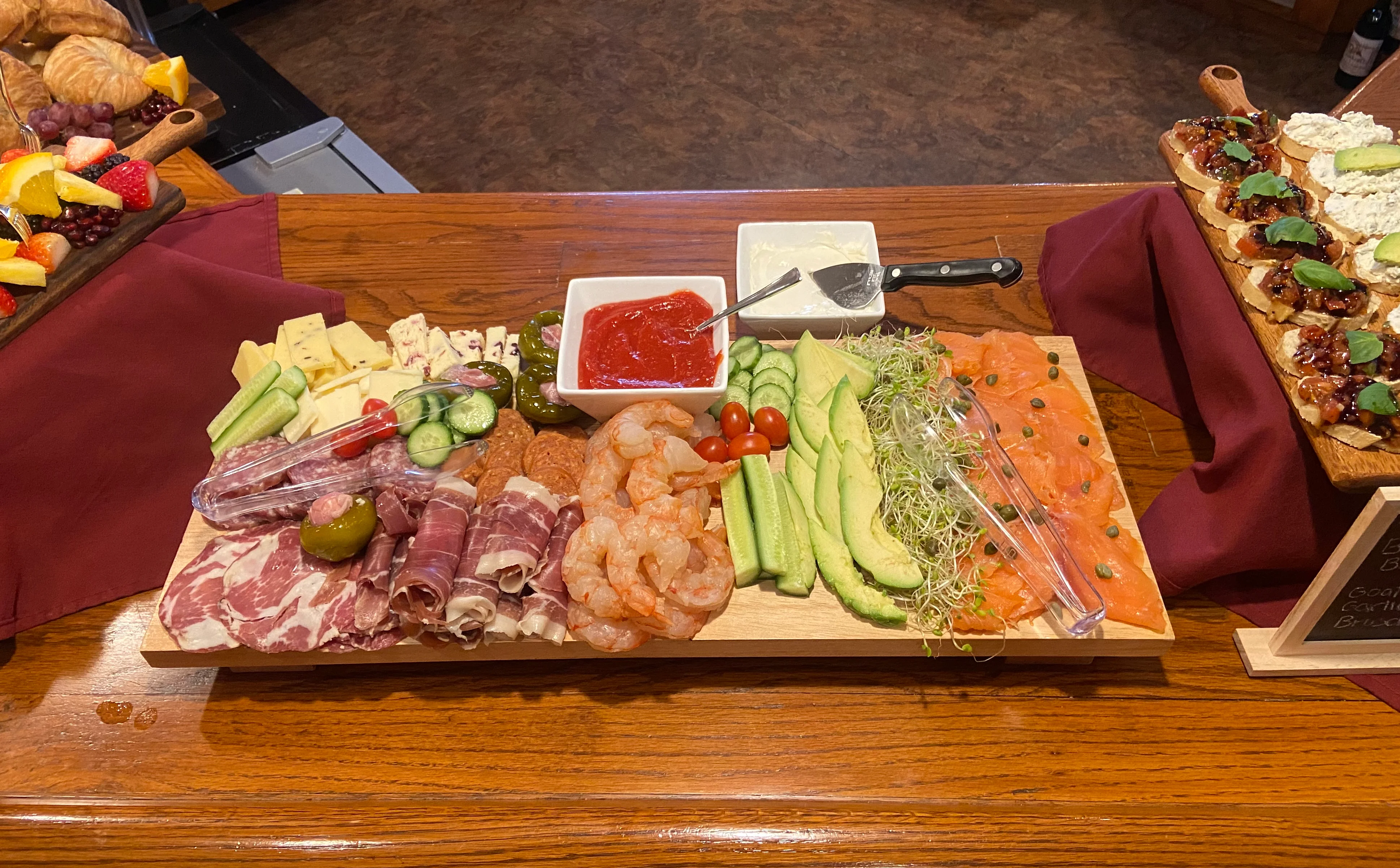 Artisan charcuterie board with seafood and cheeses