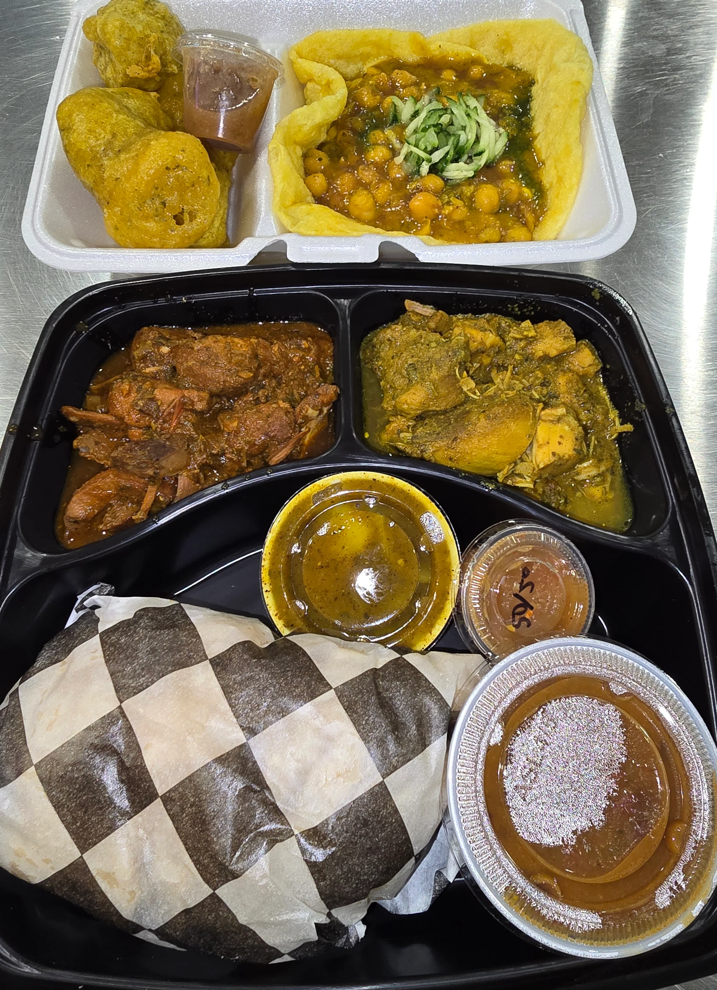 A colorful platter of assorted appetizers and small bites.