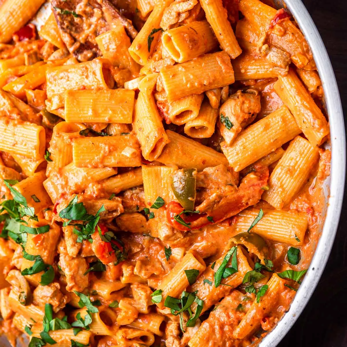 Creamy Italian rigatoni pasta with chicken and herbs