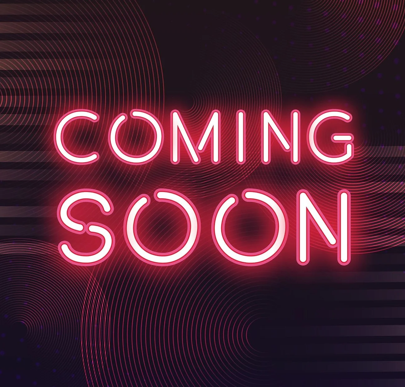 Neon sign announcing 'Coming Soon' with vibrant design
