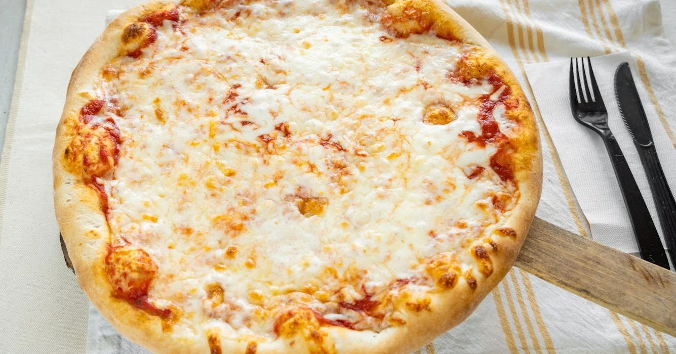 Classic Margherita pizza with melted cheese and tomato sauce