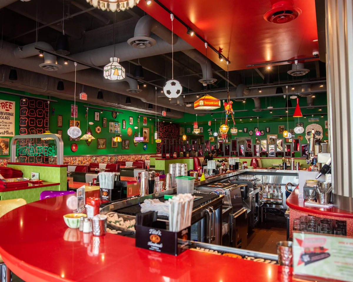 Vibrant restaurant interior with colorful decor and busy dining area